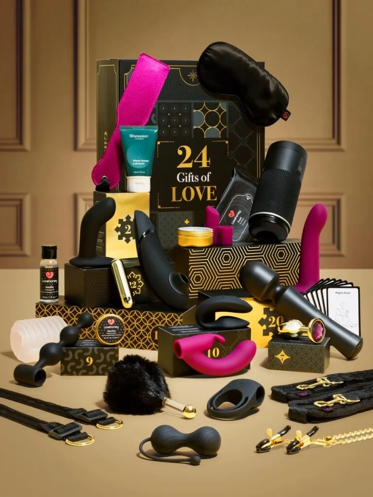 La caja y los productos del Calendario de adviento Womanizer Luxury 2025