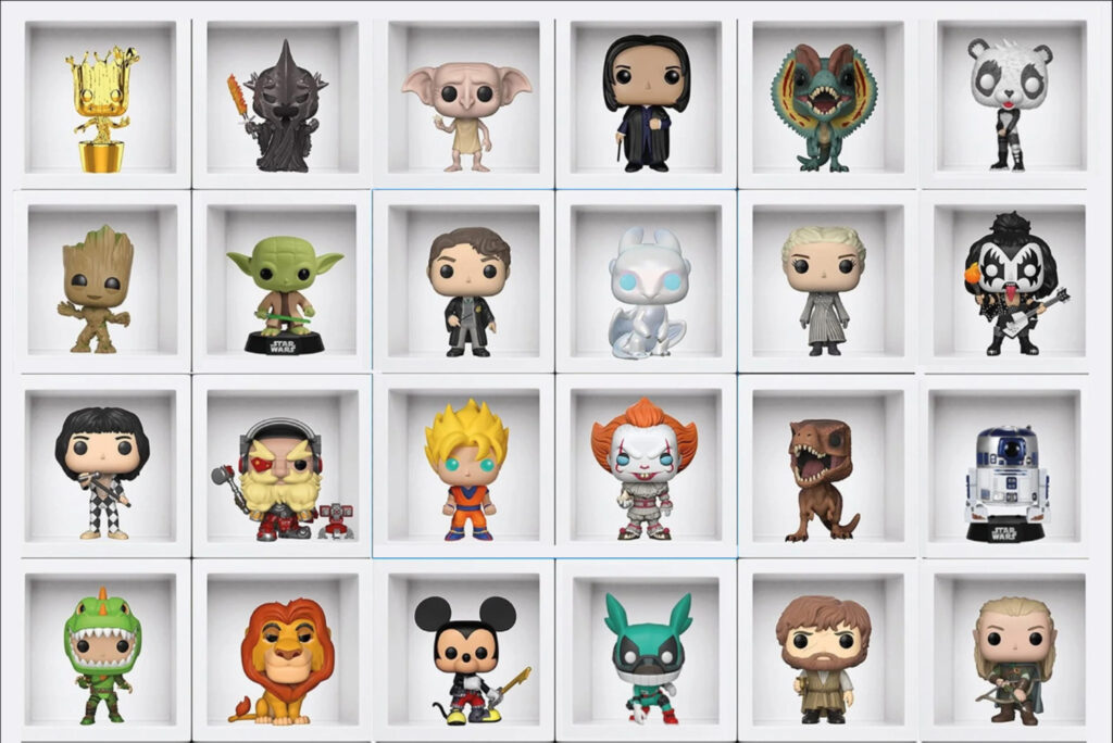 24 figuras de Funko Pop en una vitrina simulando un calendario de Adviento