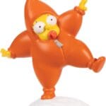 Maggie Simpson embutida en un vestido de estrella de Navidad